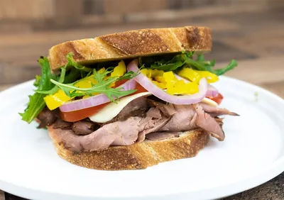 Sourdough bread, garlic aioli, mustard, roast beef, Havarti cheese, tomatoes, red onions, pepperoncinis, spring mix